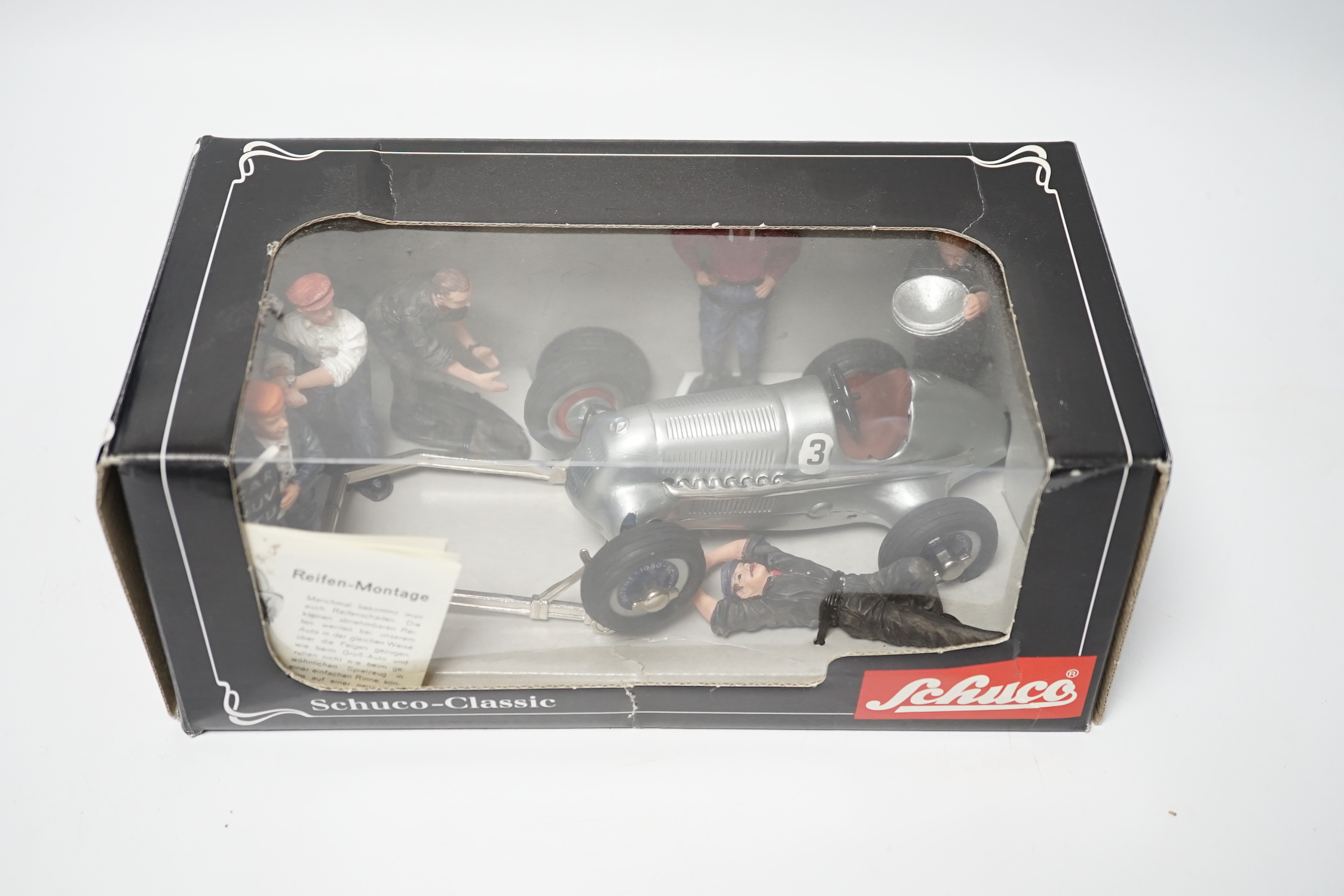 Schuco boxed Grand Prix racer at pit stop
